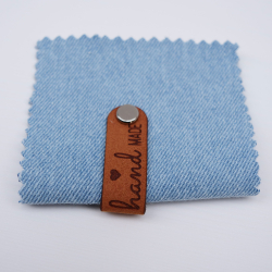 Kniklabel met schroef