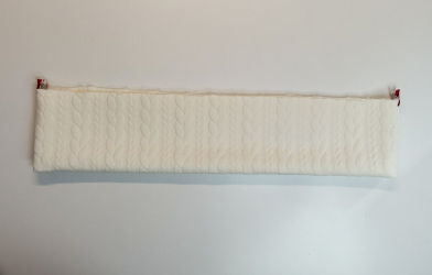 Coudre la bande du bas du pull