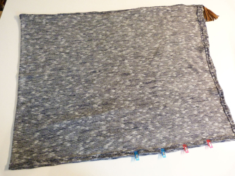 Poncho schließen