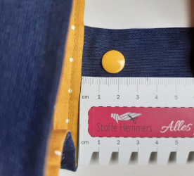 Fixer des boutons pression