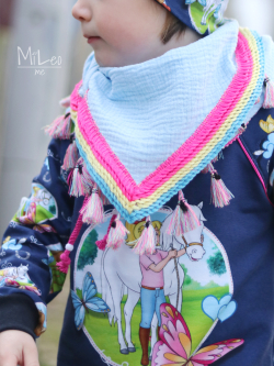 Coudre un foulard avec des pompons