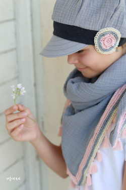 Coudre un foulard avec des pompons