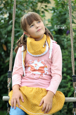 Coudre un foulard avec des pompons