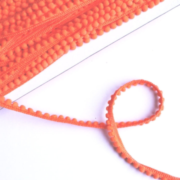 Ruban à mini pompons, orange fluo 10 mm