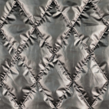 Tissu matelassé molletonné losanges effet métallique, gris