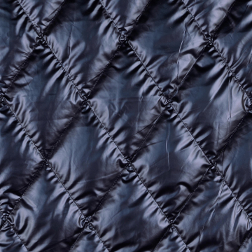 Doorgestikte stof metallic, marineblauw