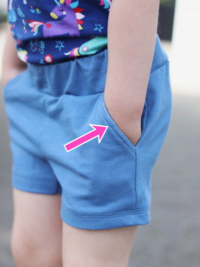 Insteekzak in broek met paspel