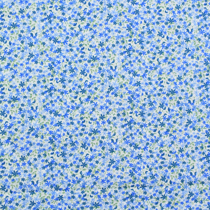 Tissu coton popeline Confettis de fleurs, bleu