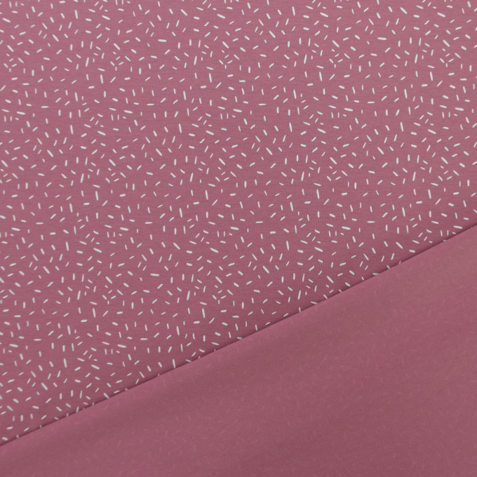 Tissu jersey de coton confetti, rose pâle