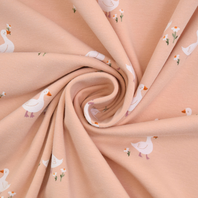 Baumwolljersey Kleine Gänse, apricot