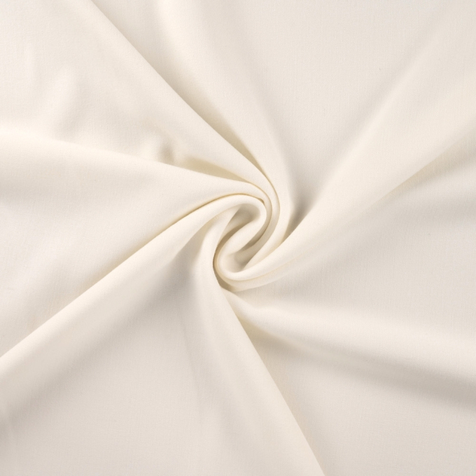 Tissu gabardine bi stretch uni, blanc cassé