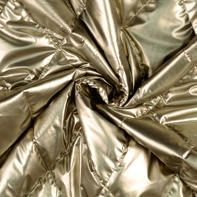 Doorgestikte stof metallic, goudkleurig