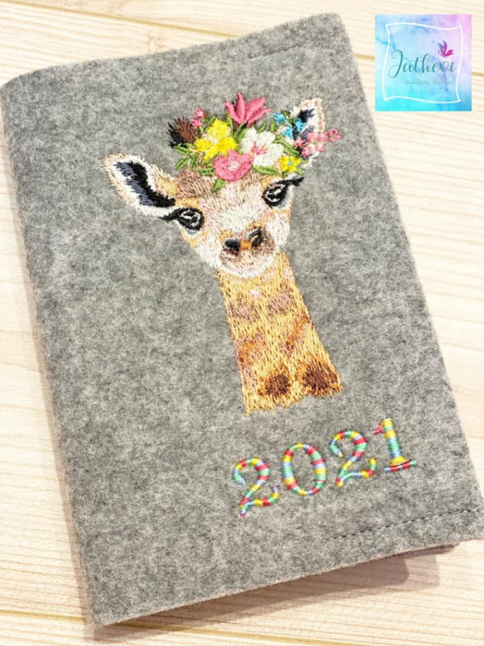 Stickdatei Stickzebra Giraffe Blumenzauber, duits