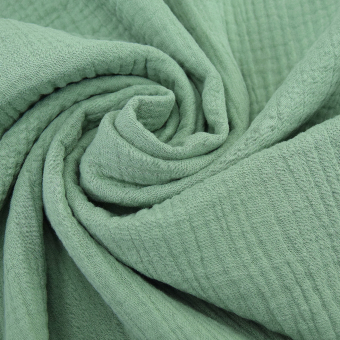 Katoenen mousseline triple gauze, vaalgroen