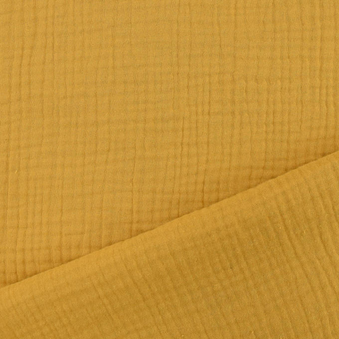 Katoenen mousseline triple gauze, mosterdgeel