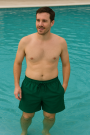 Tissu maillot de bain short homme uni, vert foncé