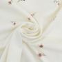 Tissu jersey de coton Fleurs Flores, blanc cassé