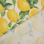 Tissu enduit coton déperlant citrons, beige
