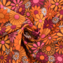 Polyesterstof flowers, mosterdgeel