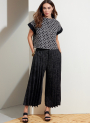 Naaipatroon Vogue 1868 designer combinatie, maat 32-55 Dui/En/Fr