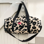 Teddy pluche animal print, crèmekleurig