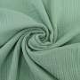 Katoenen mousseline triple gauze, vaalgroen