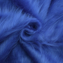 Tissu fausse fourrure à longs poils hirsutes, bleu royal